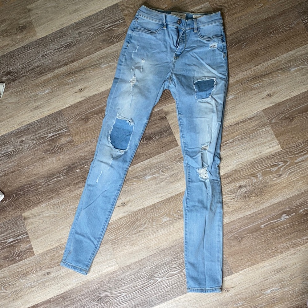 Light blue patch jeans